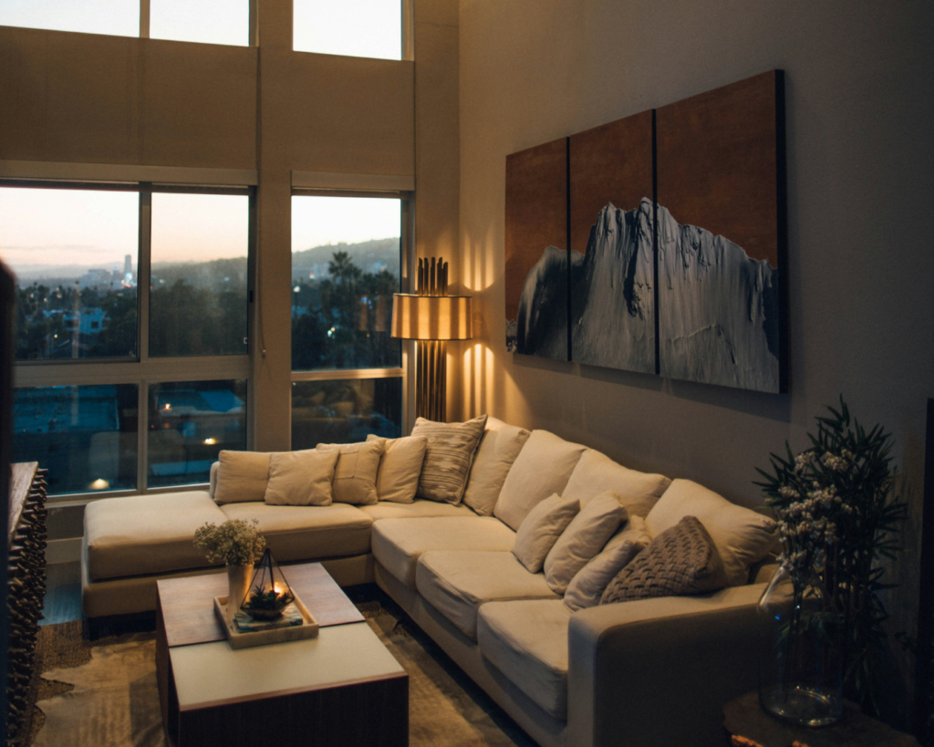 Luxury home upgrades using layered lighting and warm textures.