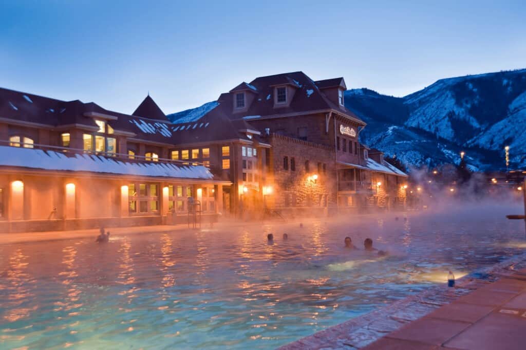 Steam rising from glenwood hot springs on a crisp fall evening